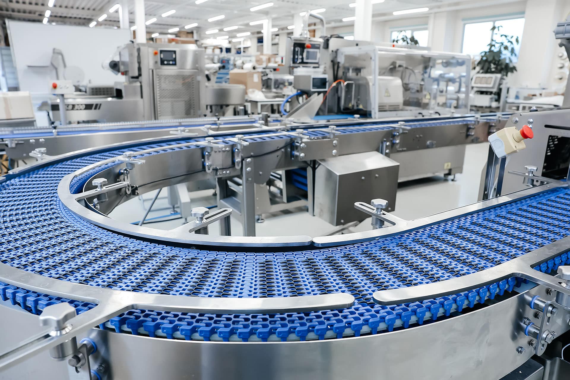 Empty modern conveyor belt of production line, part of industrial equipment in factory plant. Automatic system line